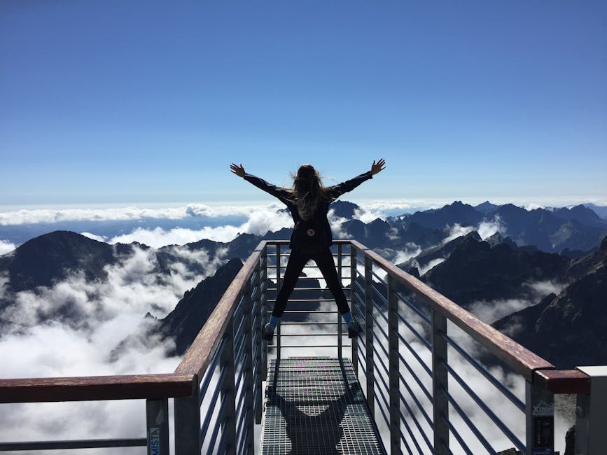 Woman at mountain viewing platform
